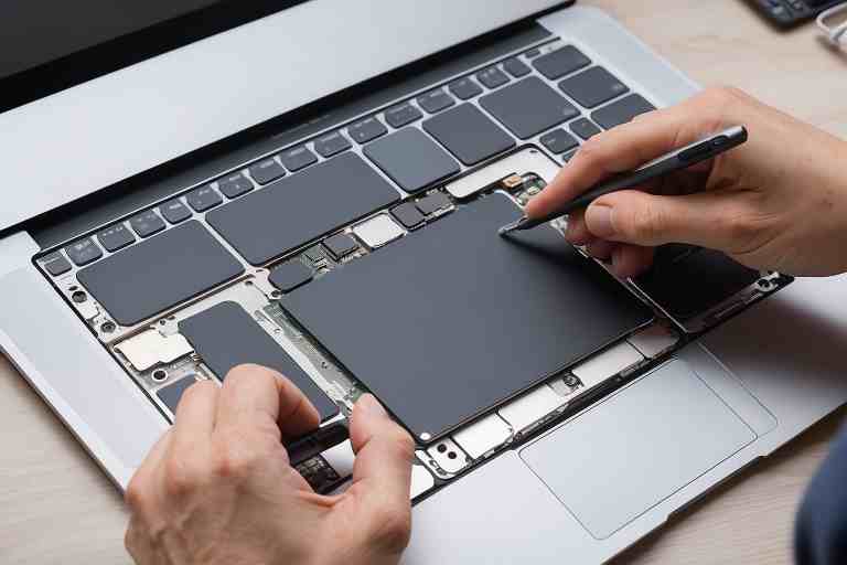 ¿Cómo reparar el trackpad en un MacBook Air 2020?